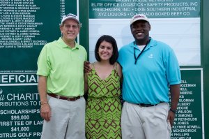 4-Ball President Joe Birkner, left, with 2012 scholarship winners Alyssa Martinez and Edward Williams.